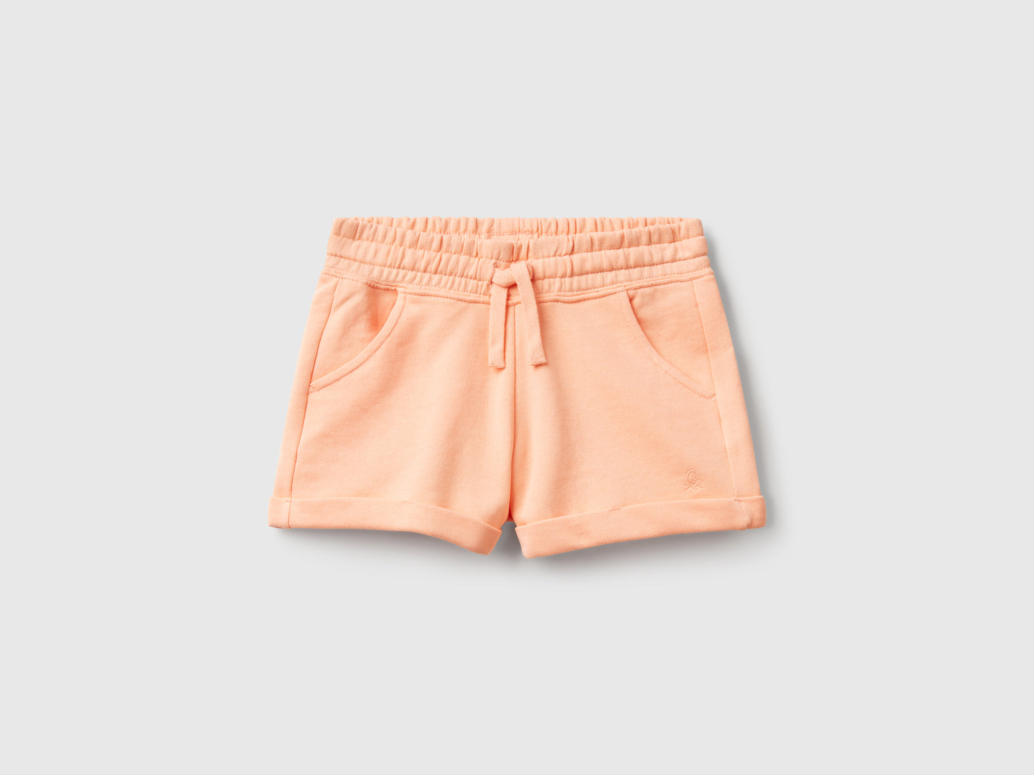Shorts in felpa 100% cotone da bambina pesca | Benetton Outlet