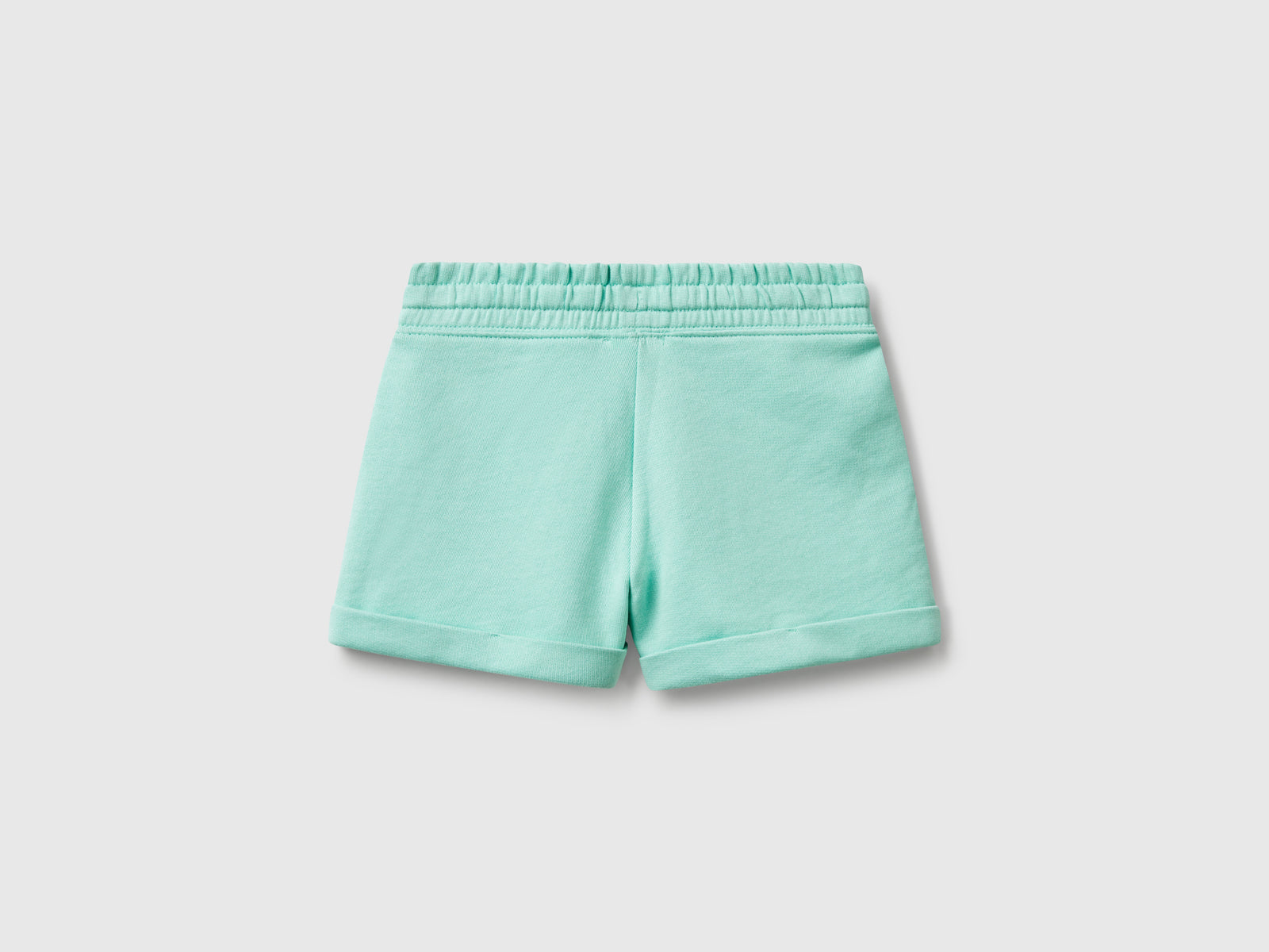 Shorts in felpa 100% cotone da bambina verde acqua 2 | Benetton Outlet
