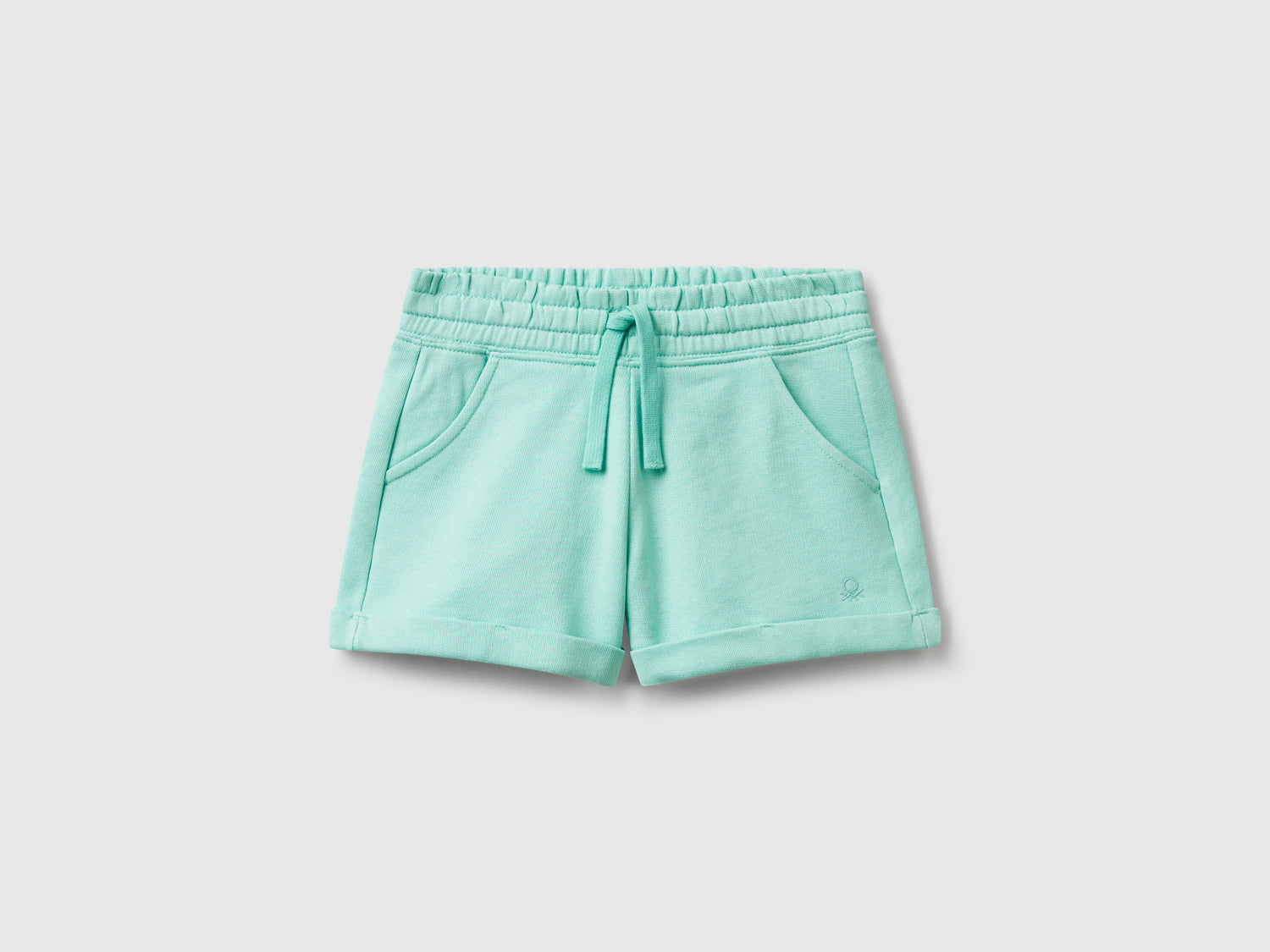 Shorts in felpa 100% cotone da bambina verde acqua | Benetton Outlet