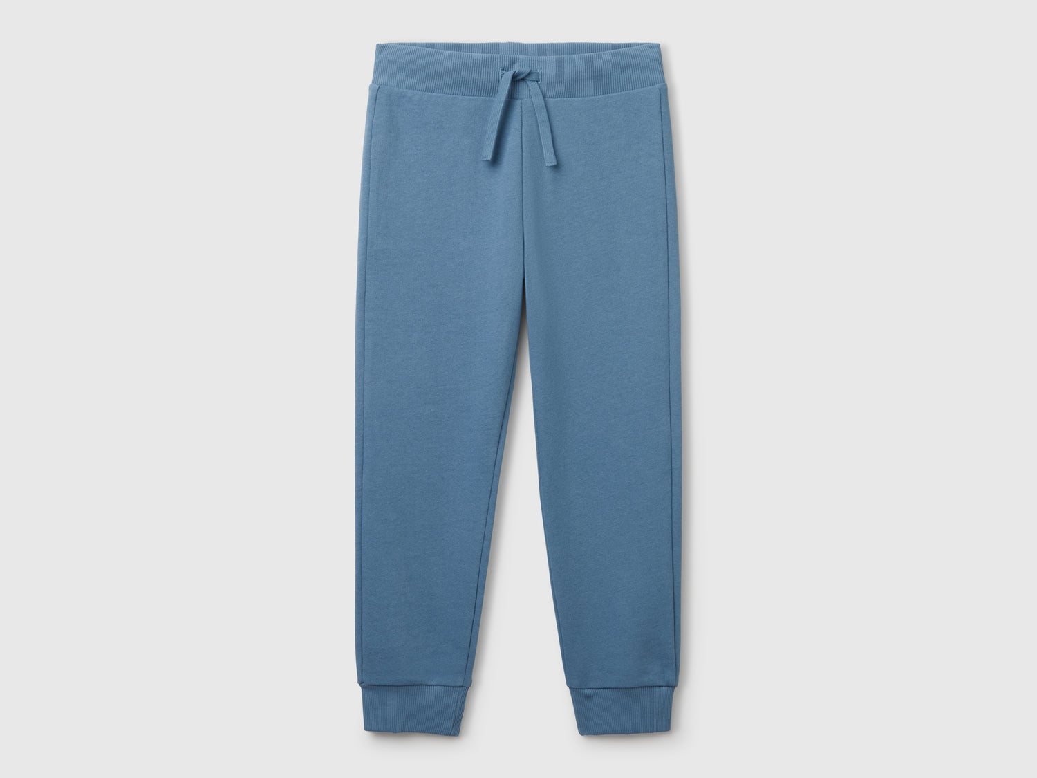 Pantaloni sportivi con coulisse da bambino azzurro | Benetton Outlet