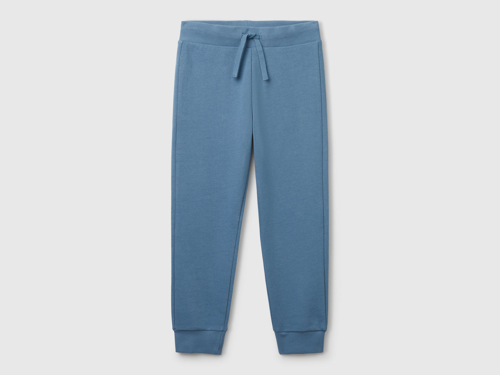 Pantaloni sportivi con coulisse da bambino azzurro | Benetton Outlet