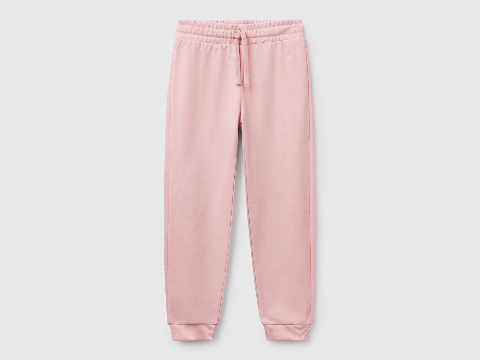 Pantaloni in felpa con logo da bambina rosa | Benetton Outlet