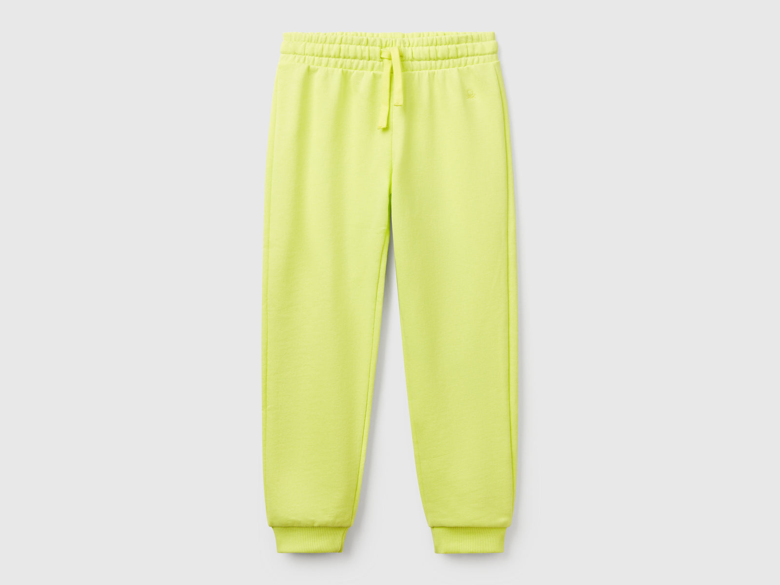 Pantaloni in felpa con logo da bambina lime | Benetton Outlet