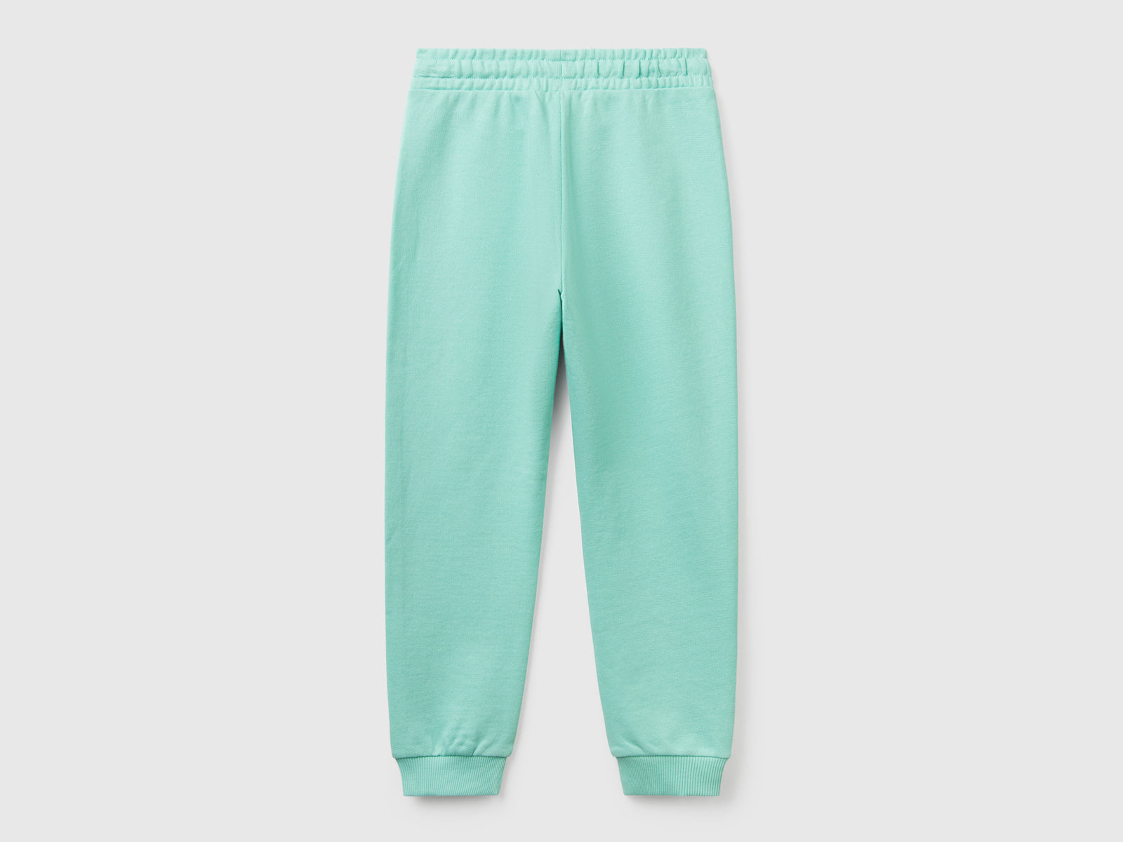 Pantaloni in felpa con logo da bambina verde acqua 2 | Benetton Outlet