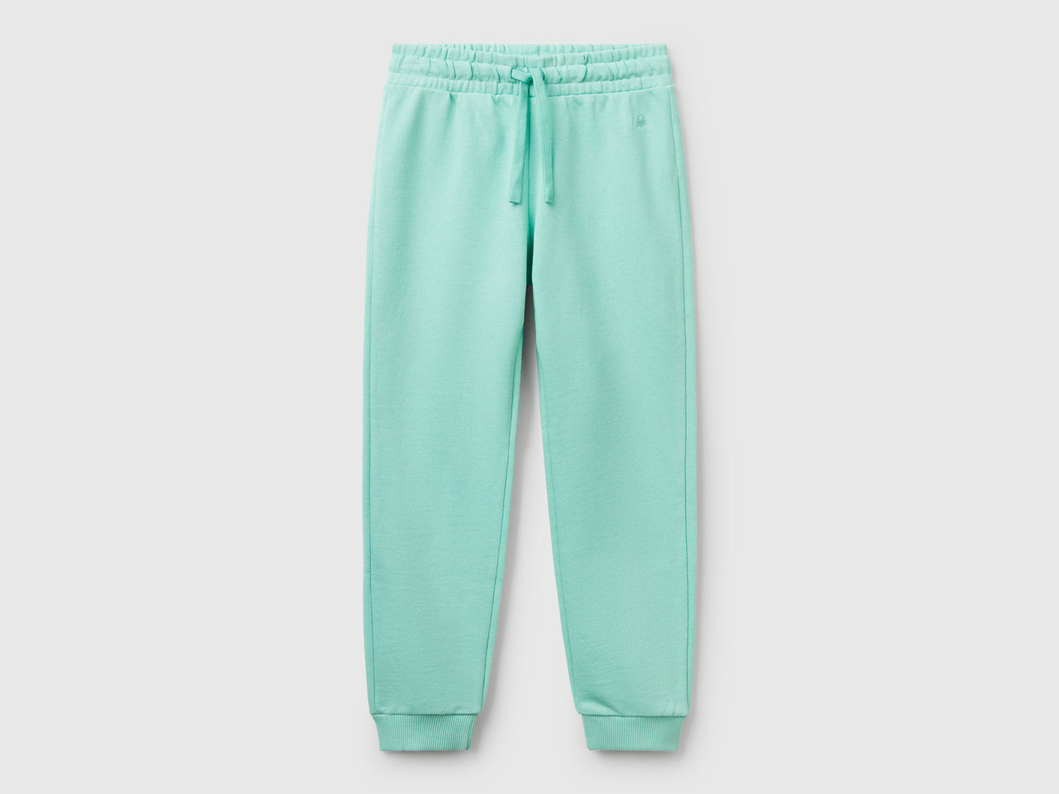 Pantaloni in felpa con logo da bambina verde acqua | Benetton Outlet