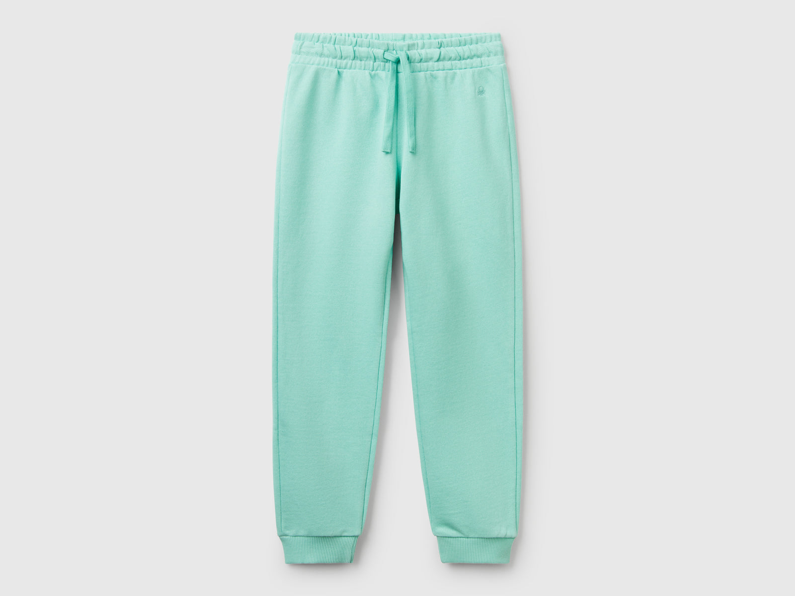 Pantaloni in felpa con logo da bambina verde acqua | Benetton Outlet