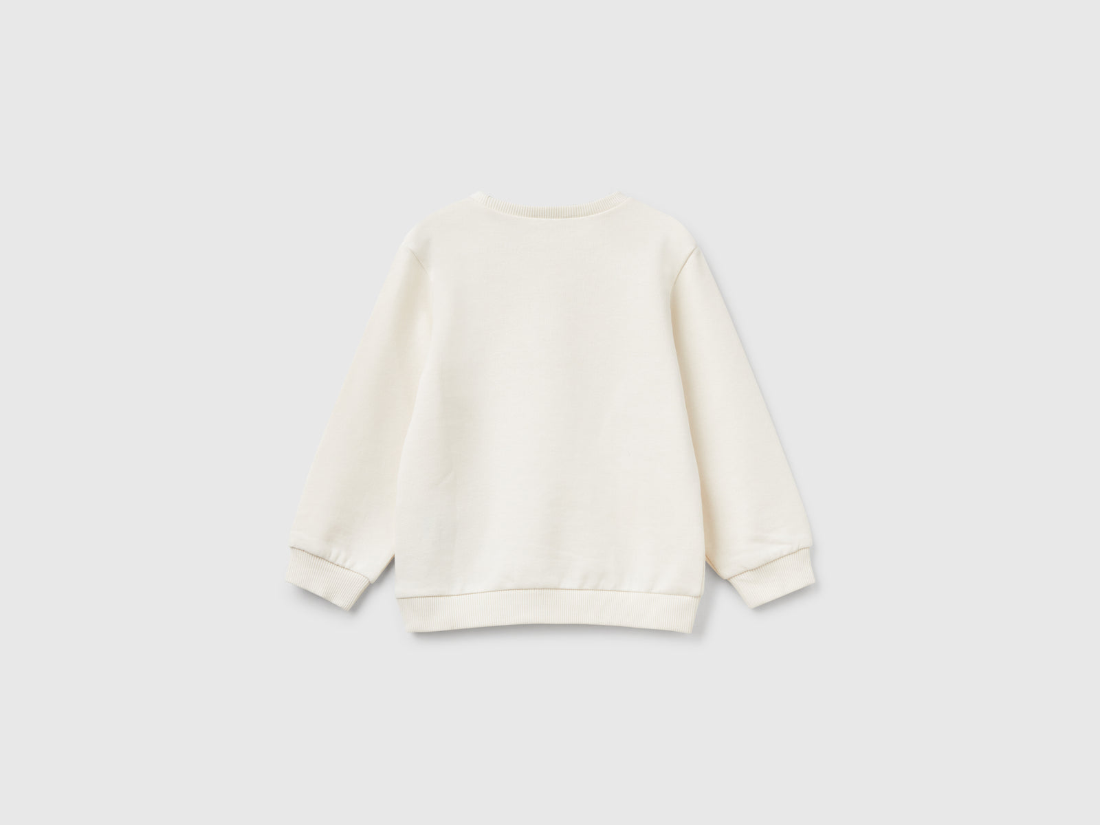 Felpa con applicazione effetto petali da bimba bianco panna 2 | Benetton Outlet