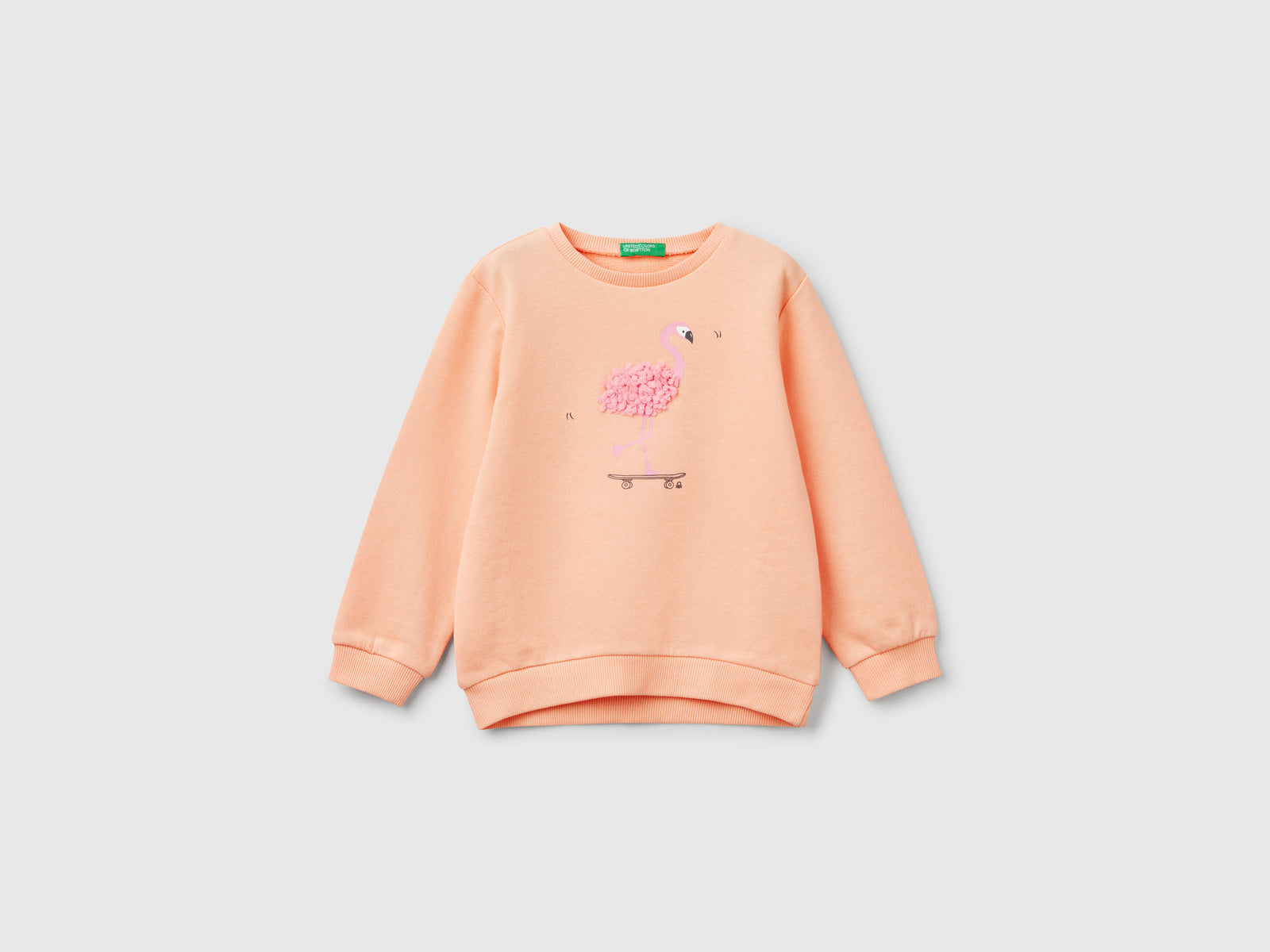 Felpa con applicazione effetto petali da bimba pesca | Benetton Outlet