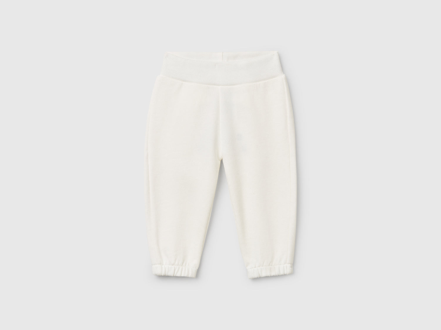 Pantaloni in felpa di cotone da neonato bianco panna | Benetton Outlet