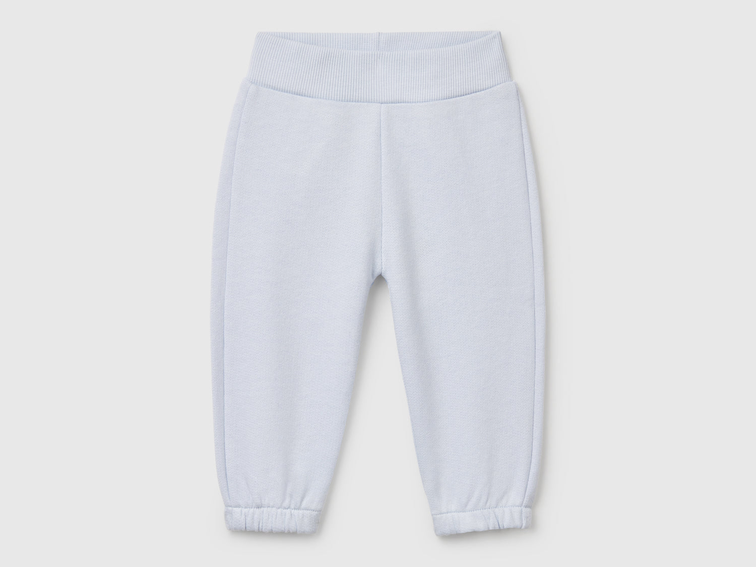 Pantaloni in felpa di cotone da neonato celeste | Benetton Outlet