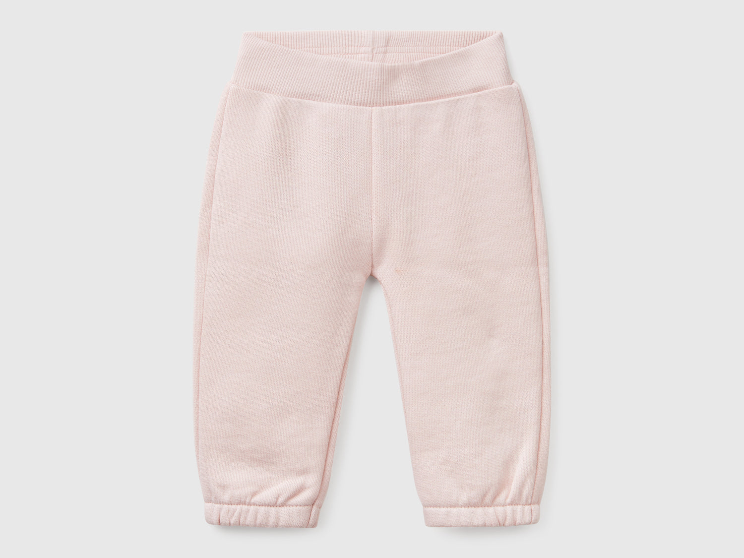 Pantaloni in felpa di cotone da neonato rosa tenue | Benetton Outlet