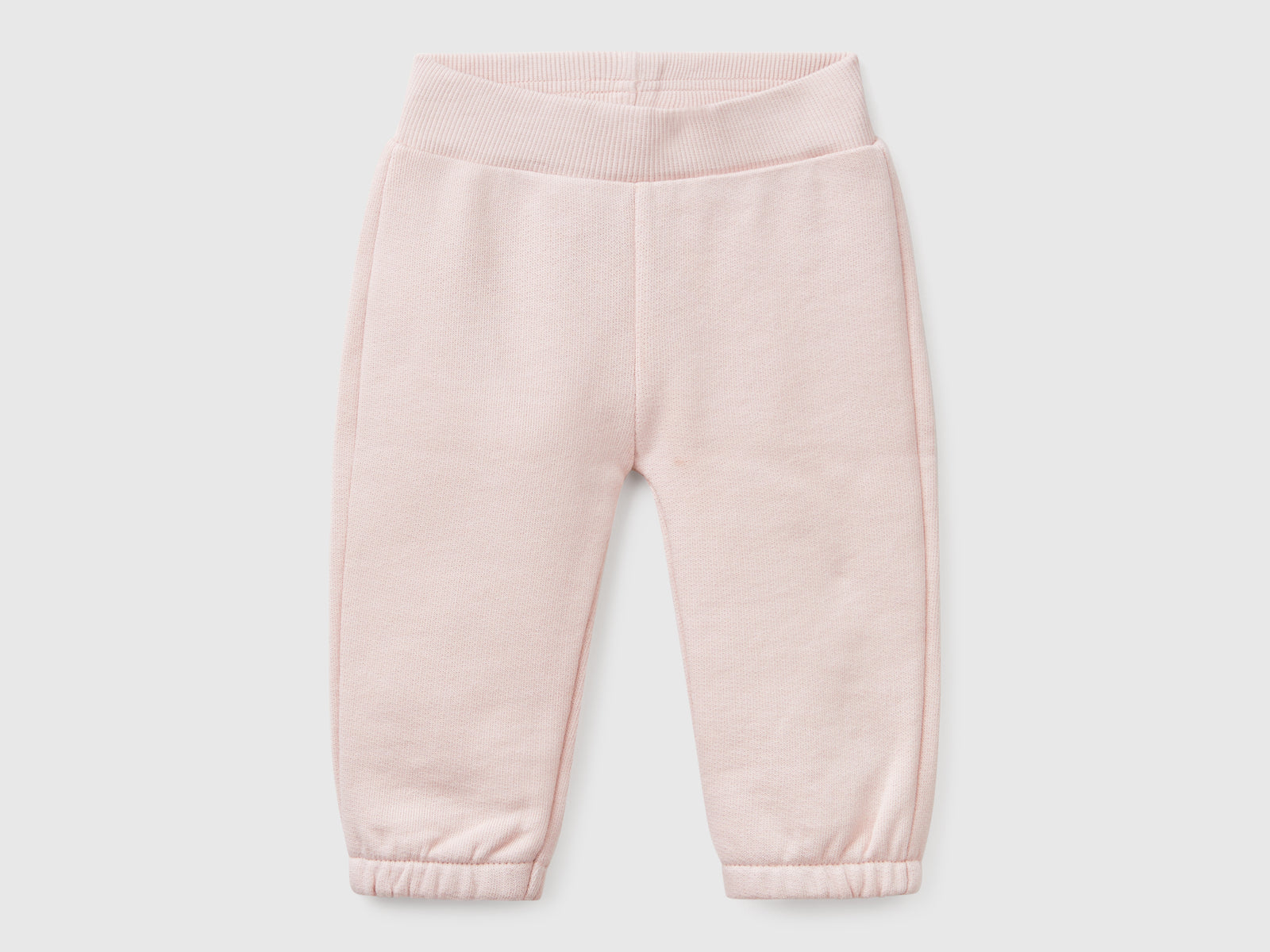 Pantaloni in felpa di cotone da neonato rosa tenue | Benetton Outlet