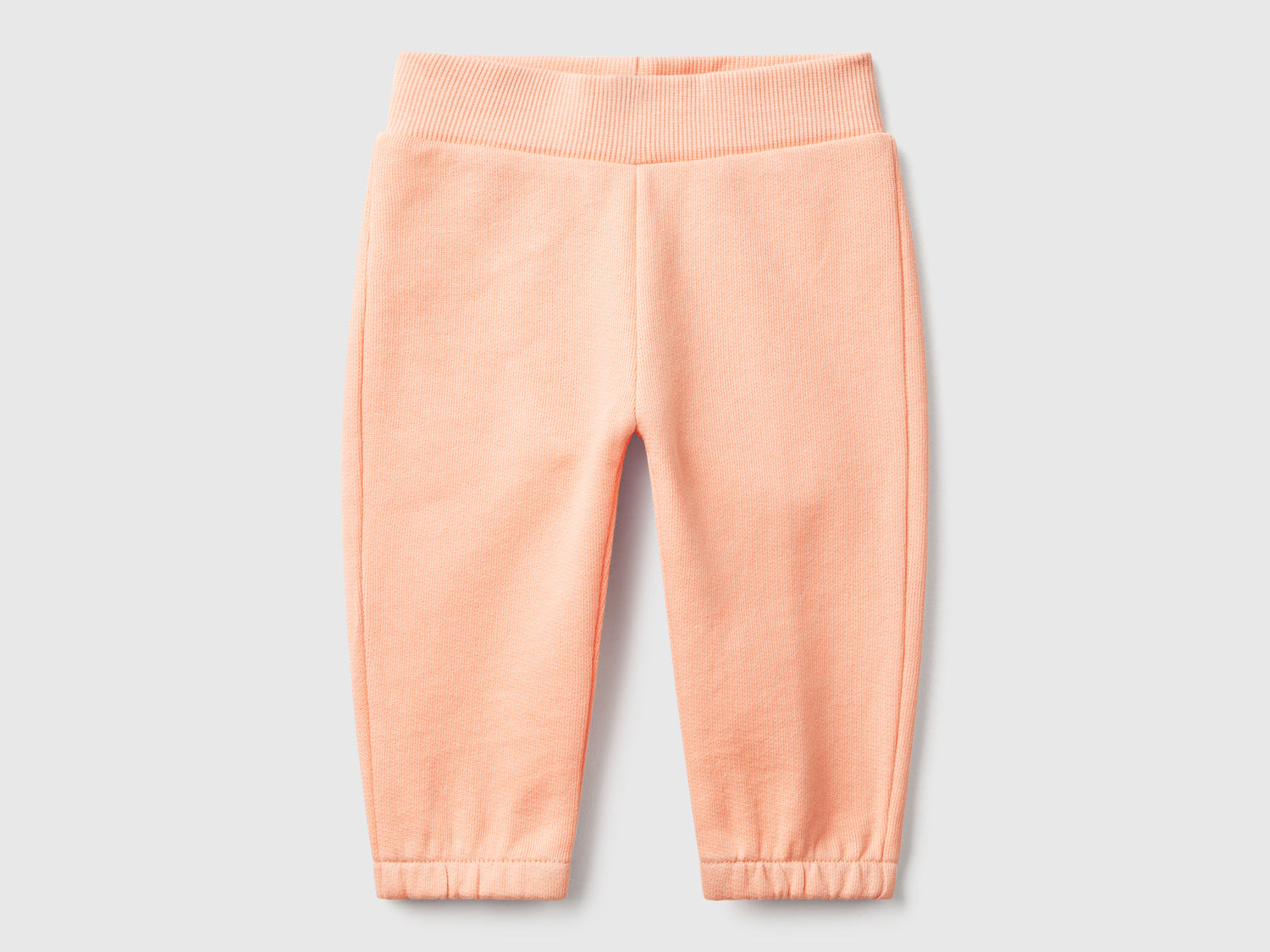Pantaloni in felpa di cotone da neonato pesca | Benetton Outlet