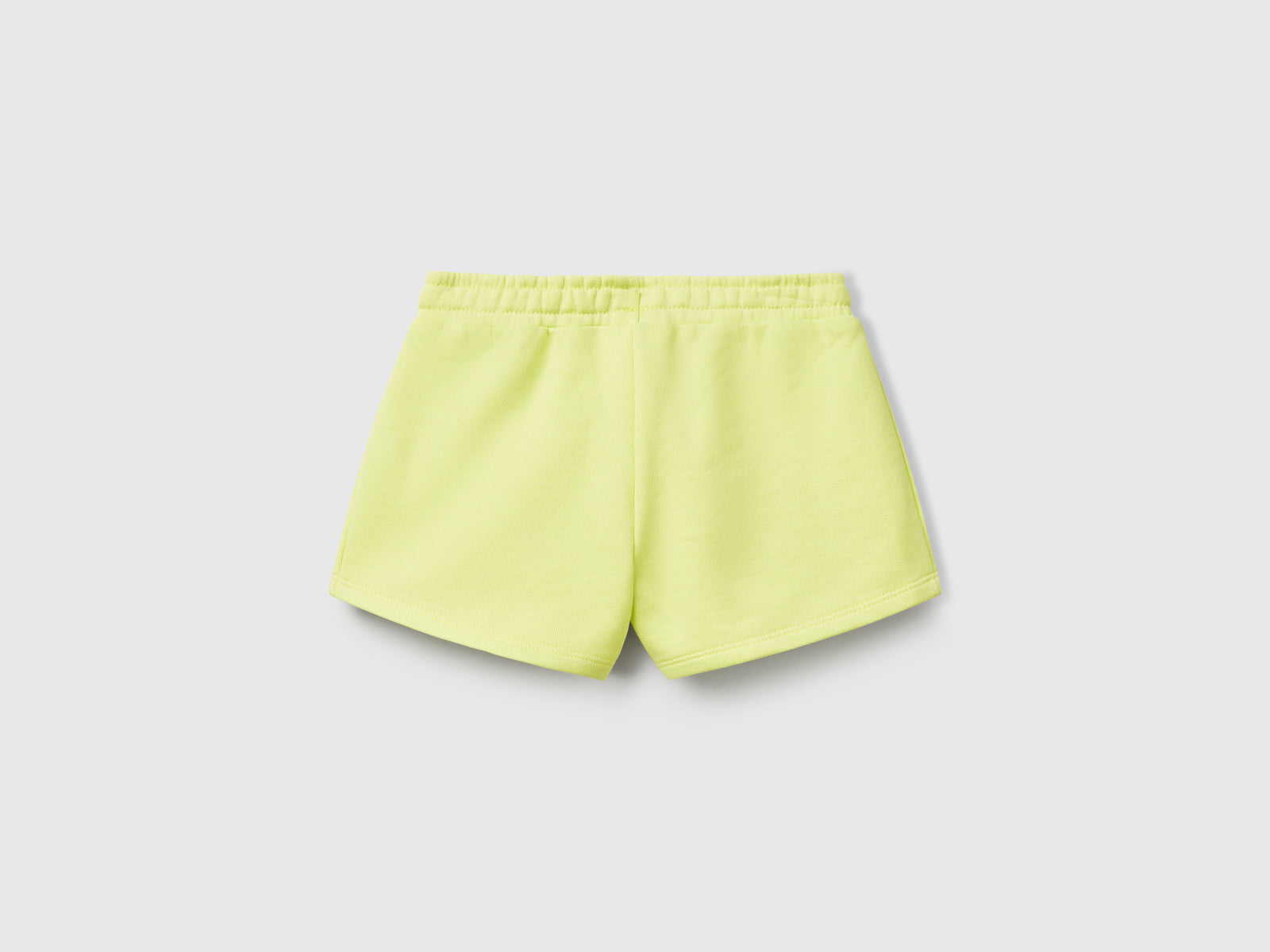Shorts in felpa di cotone da bimba giallo 2 | Benetton Outlet