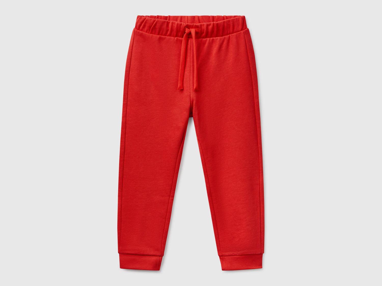 Pantaloni in cotone con logo da bimbo rosso | Benetton Outlet