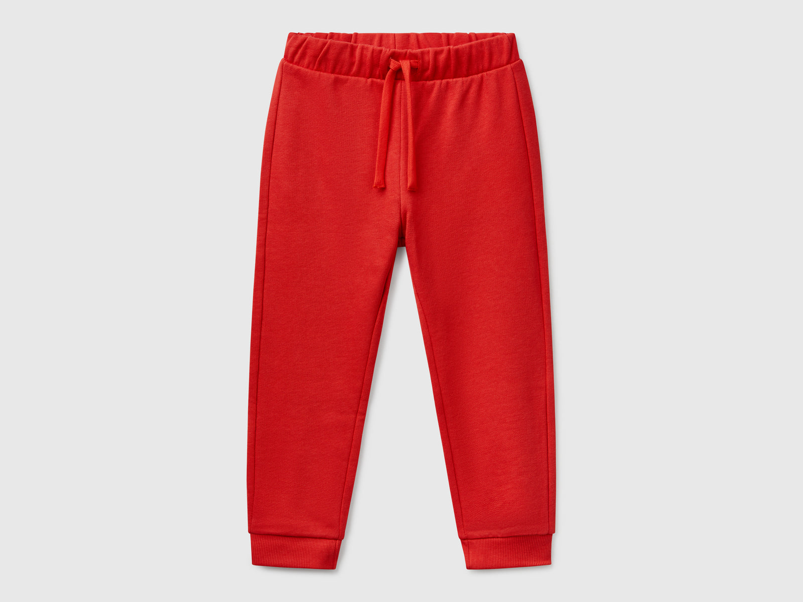 Pantaloni in cotone con logo da bimbo rosso | Benetton Outlet