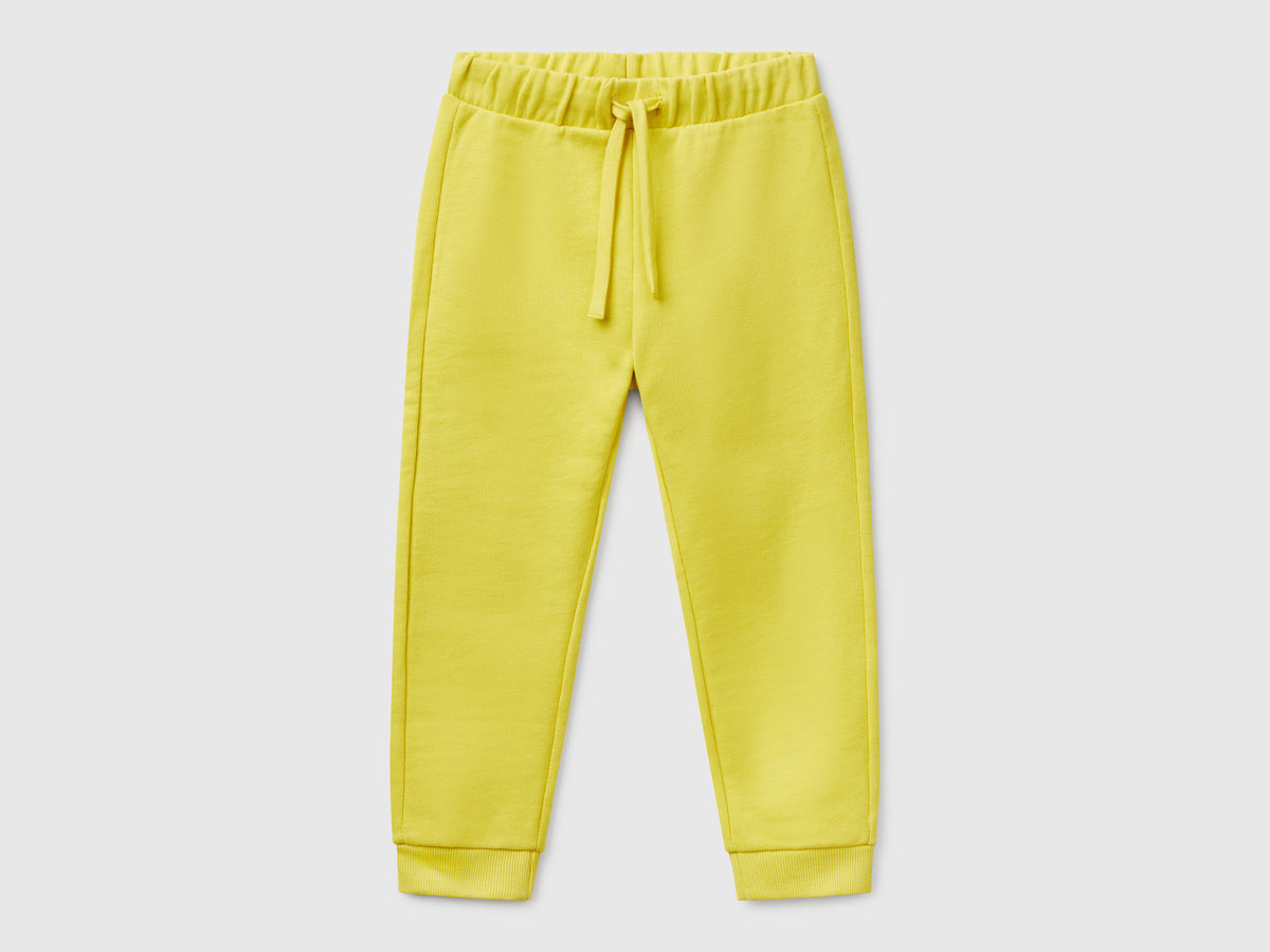Pantaloni in cotone con logo da bimbo lime Benetton Outlet
