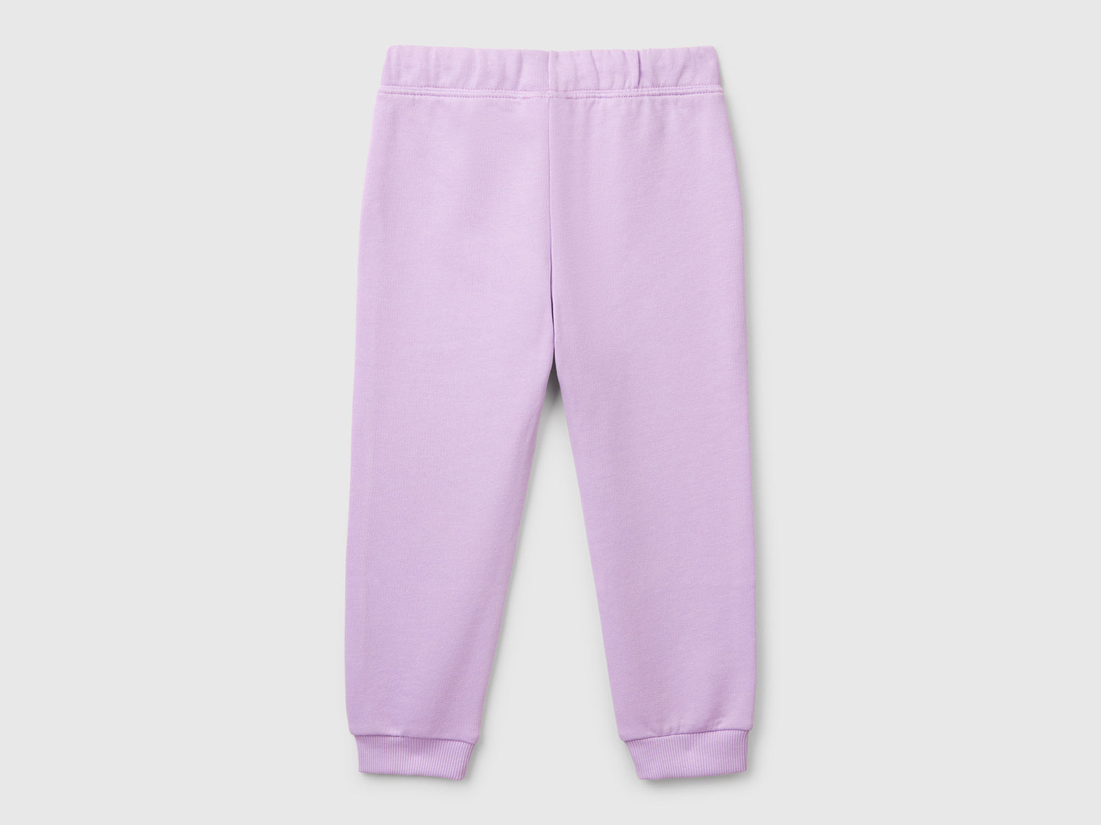 Pantaloni in felpa di cotone da bimba lilla 2 | Benetton Outlet