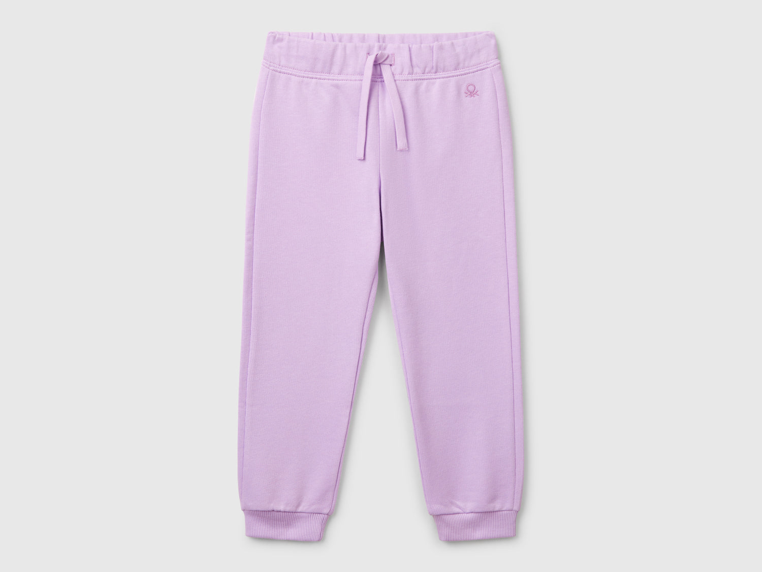 Pantaloni in felpa di cotone da bimba lilla | Benetton Outlet