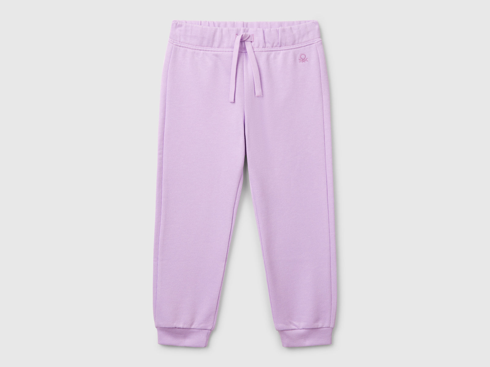 Pantaloni in felpa di cotone da bimba lilla | Benetton Outlet