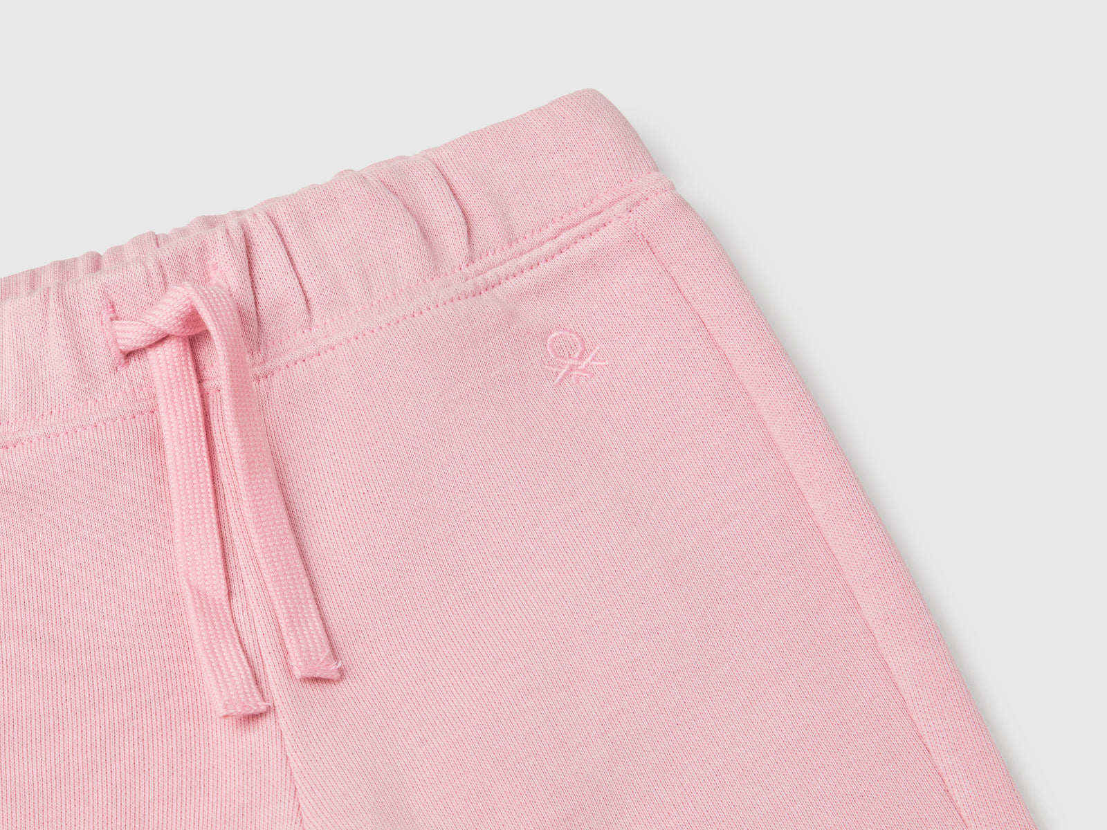 Pantaloni in felpa di cotone da bimba rosa 3 | Benetton Outlet