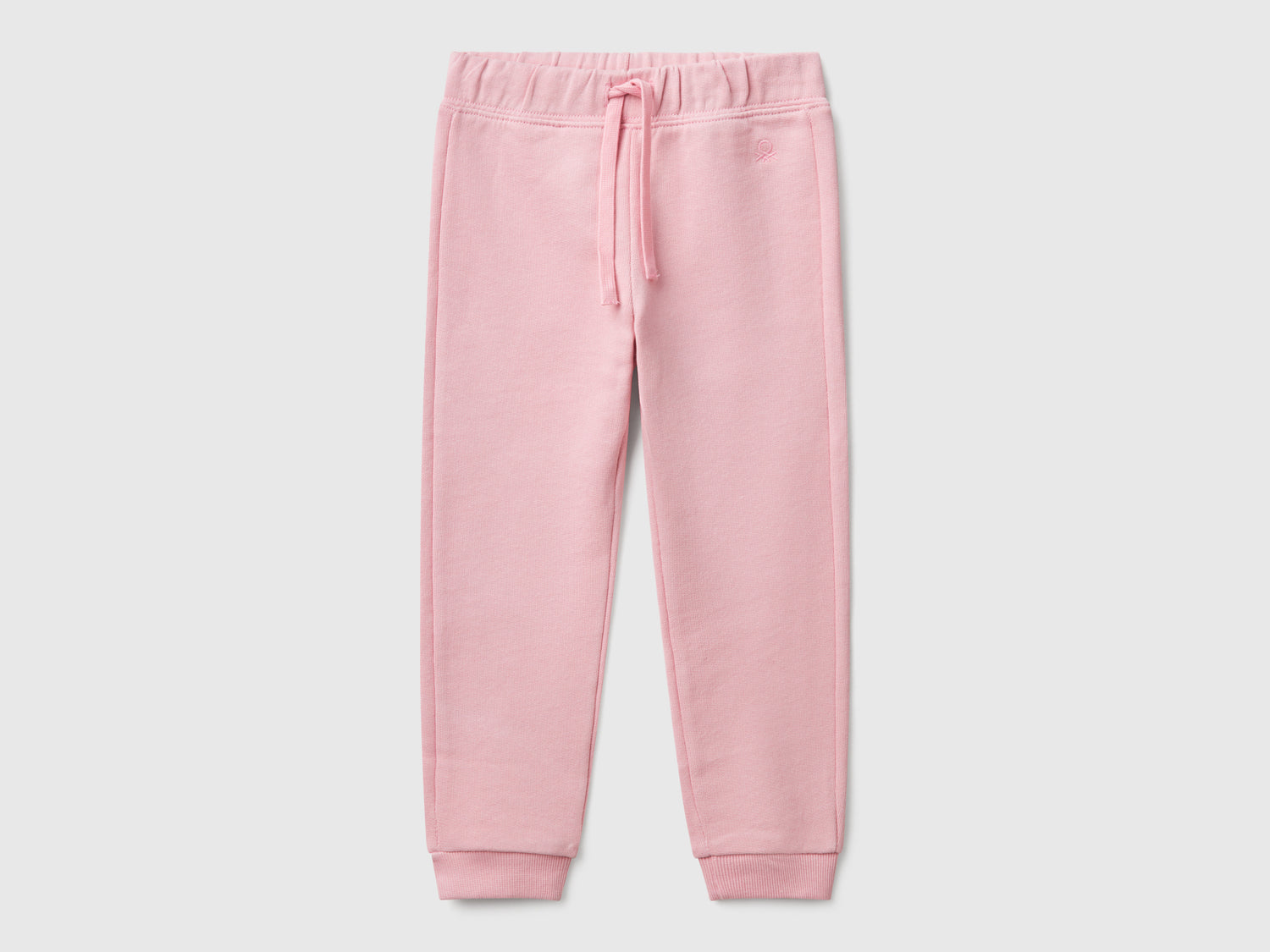 Pantaloni in felpa di cotone da bimba rosa | Benetton Outlet
