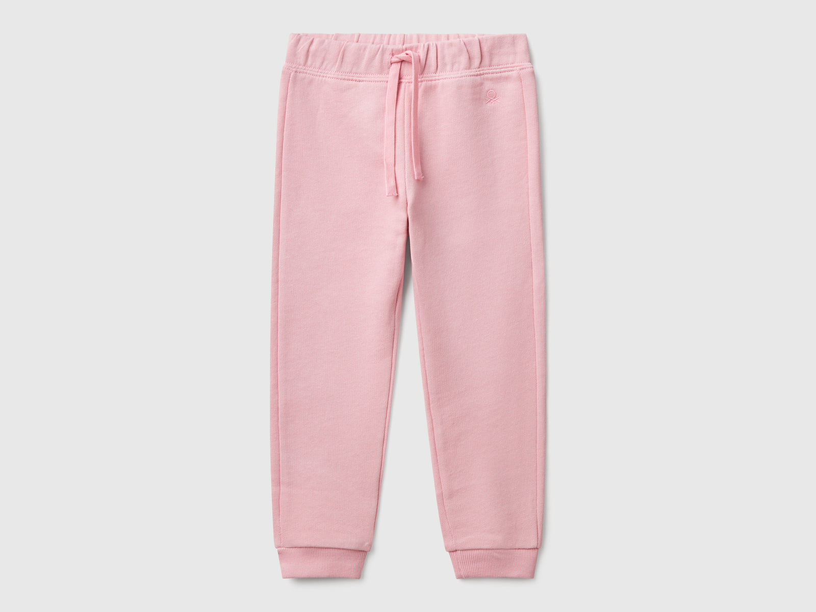 Pantaloni in felpa di cotone da bimba rosa | Benetton Outlet