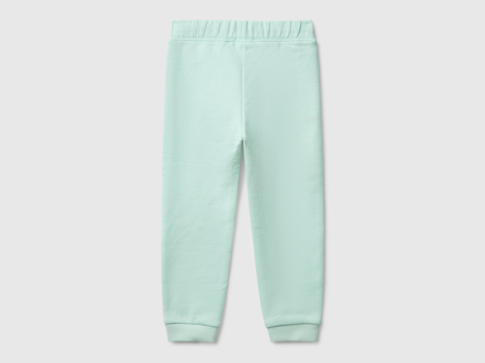 Pantaloni in felpa di cotone da bimba verde acqua 2 | Benetton Outlet