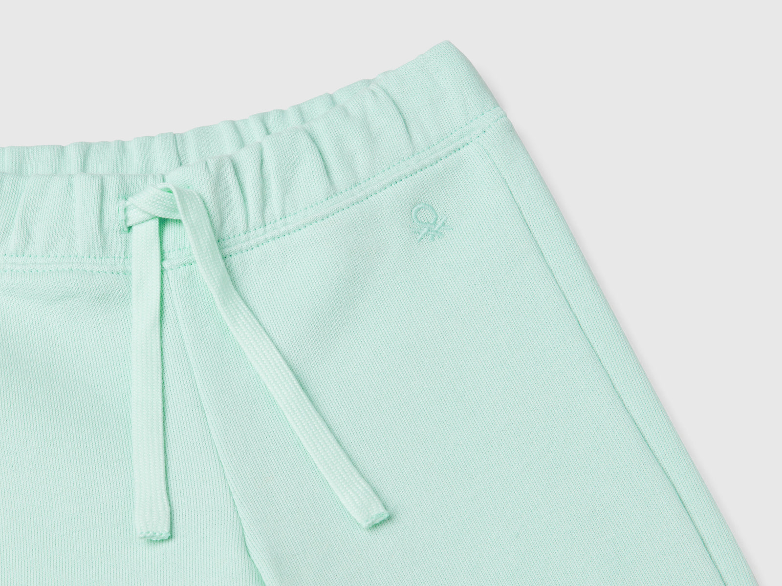 Pantaloni in felpa di cotone da bimba verde acqua 3 | Benetton Outlet