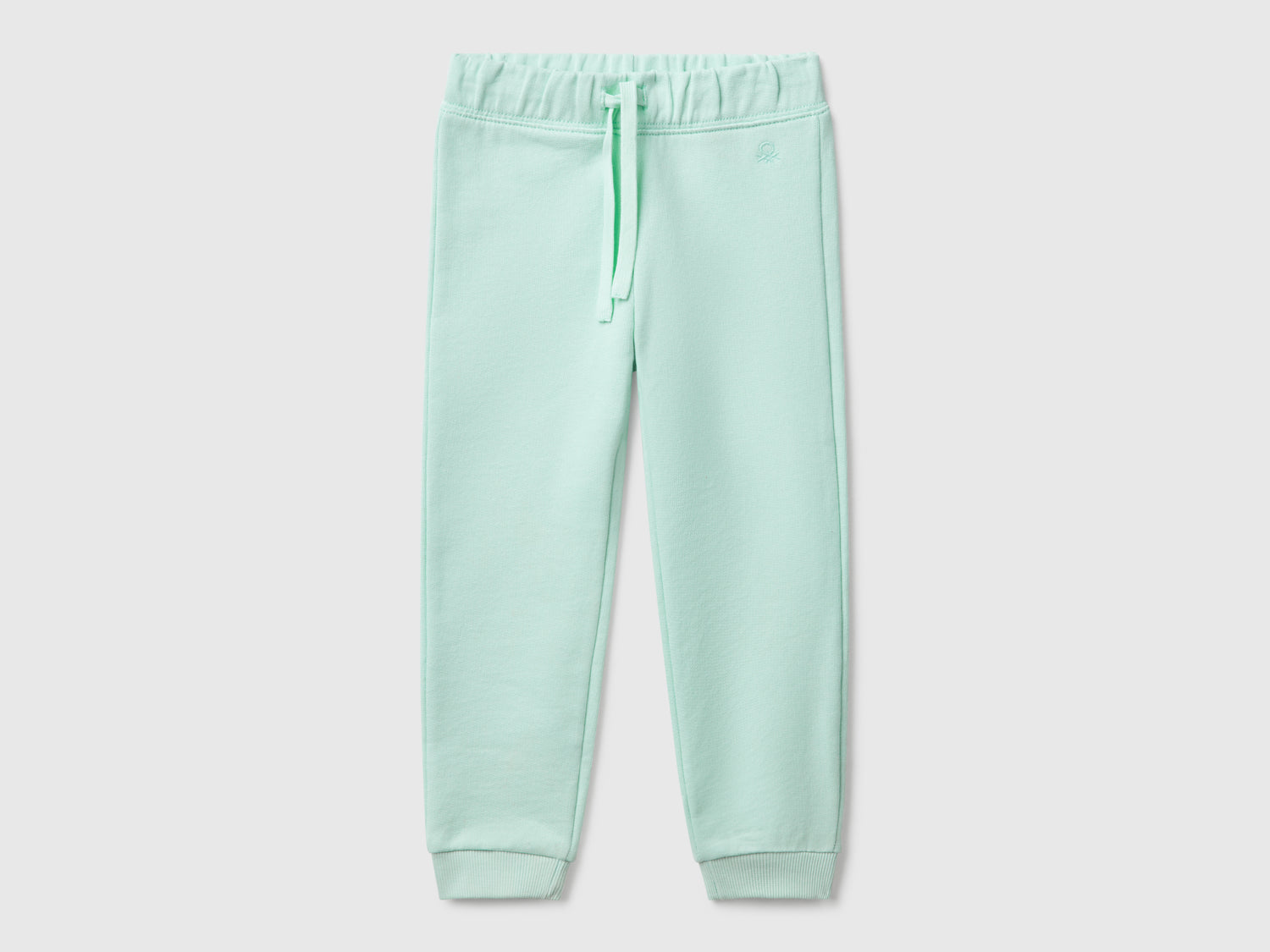 Pantaloni in felpa di cotone da bimba verde acqua | Benetton Outlet