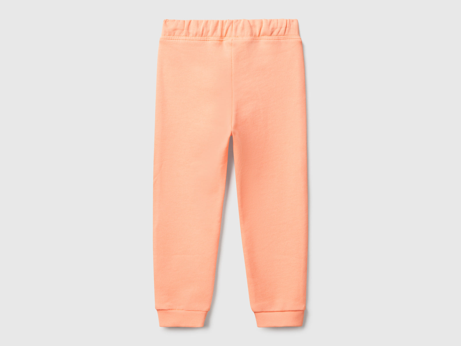 Pantaloni in felpa di cotone da bimba pesca 2 | Benetton Outlet