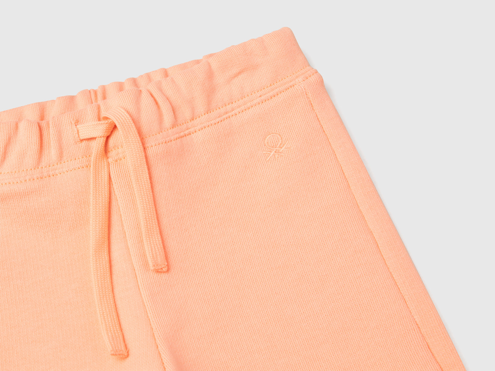 Pantaloni in felpa di cotone da bimba pesca 3 | Benetton Outlet