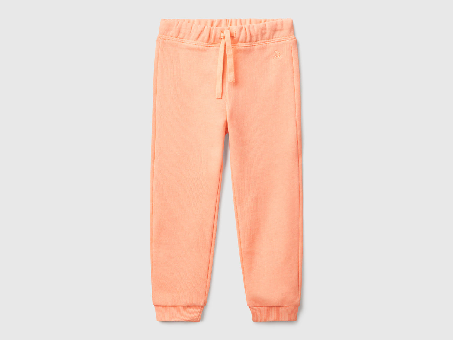Pantaloni in felpa di cotone da bimba pesca | Benetton Outlet