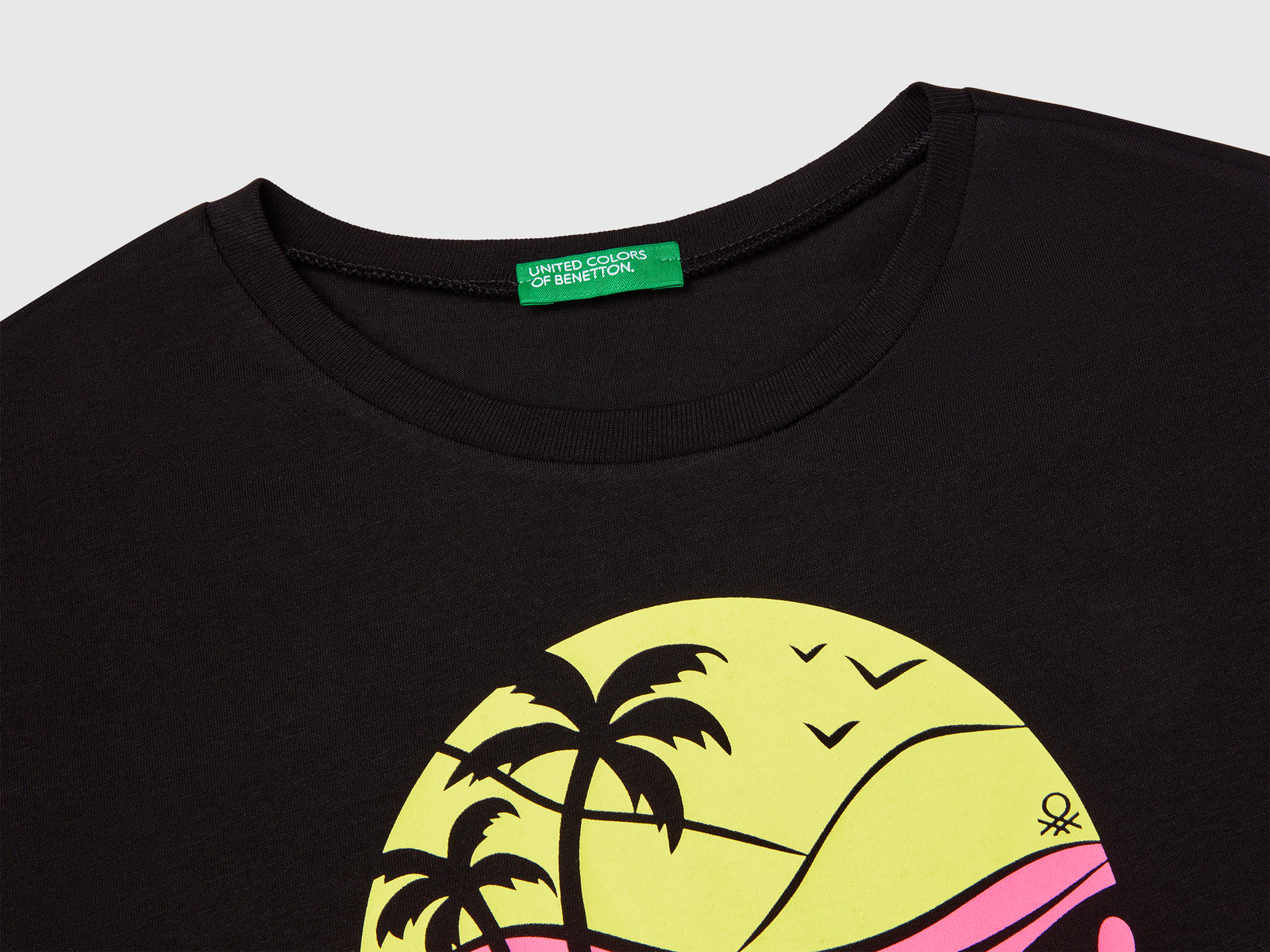 T-shirt con stampa fluo da bambina nero 3 | Benetton Outlet