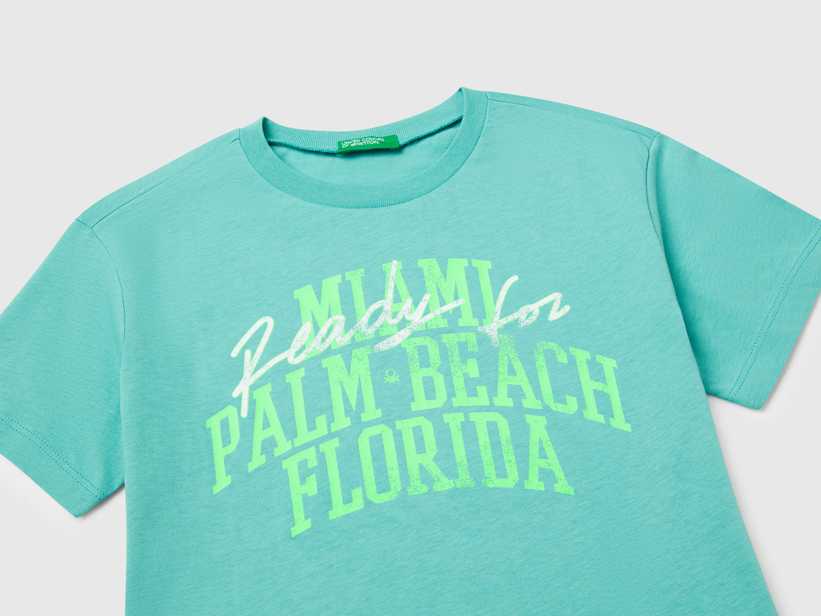 T-shirt con stampa fluo da bambino verde acqua 3 | Benetton Outlet