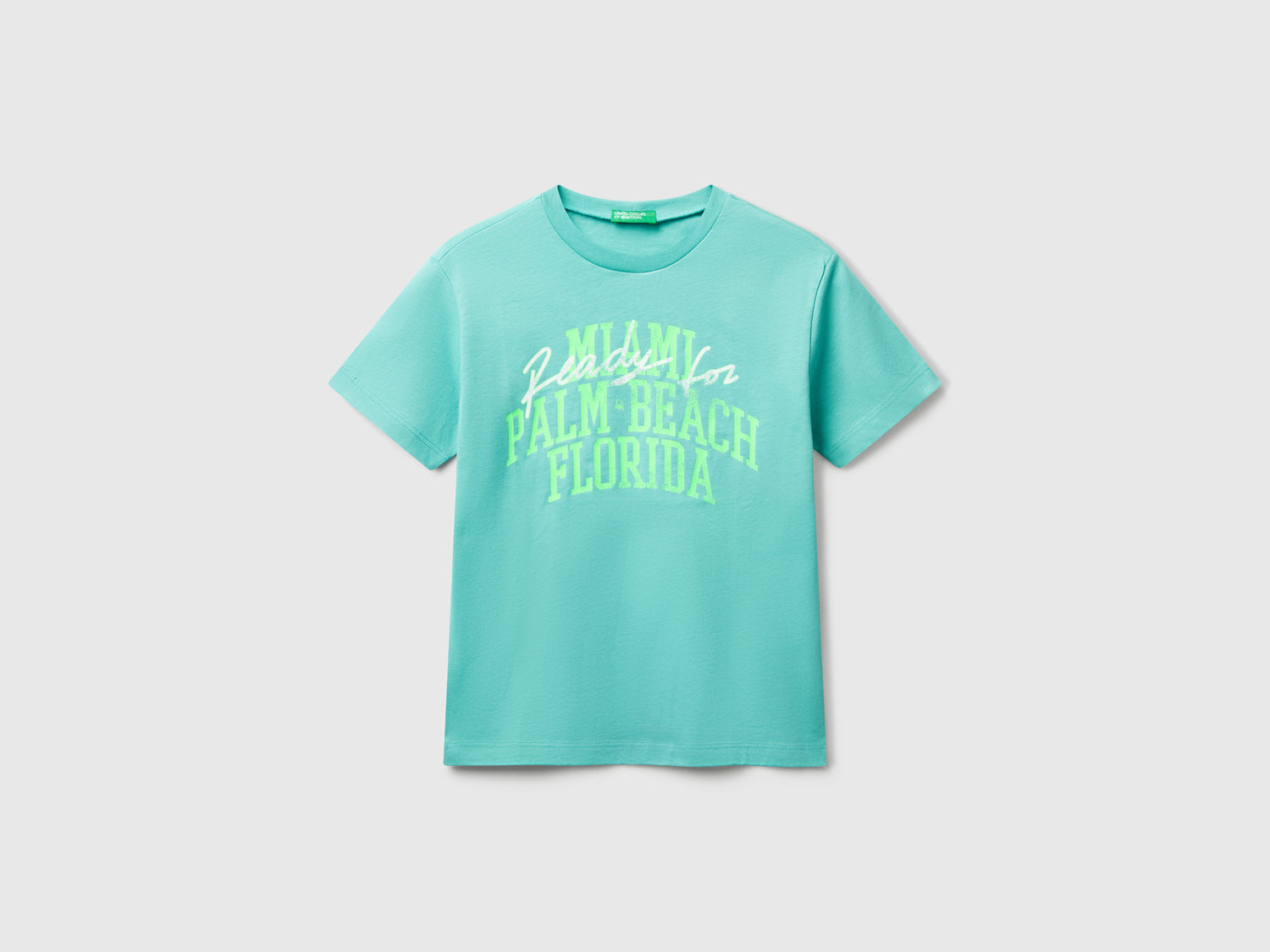 T-shirt con stampa fluo da bambino verde acqua | Benetton Outlet