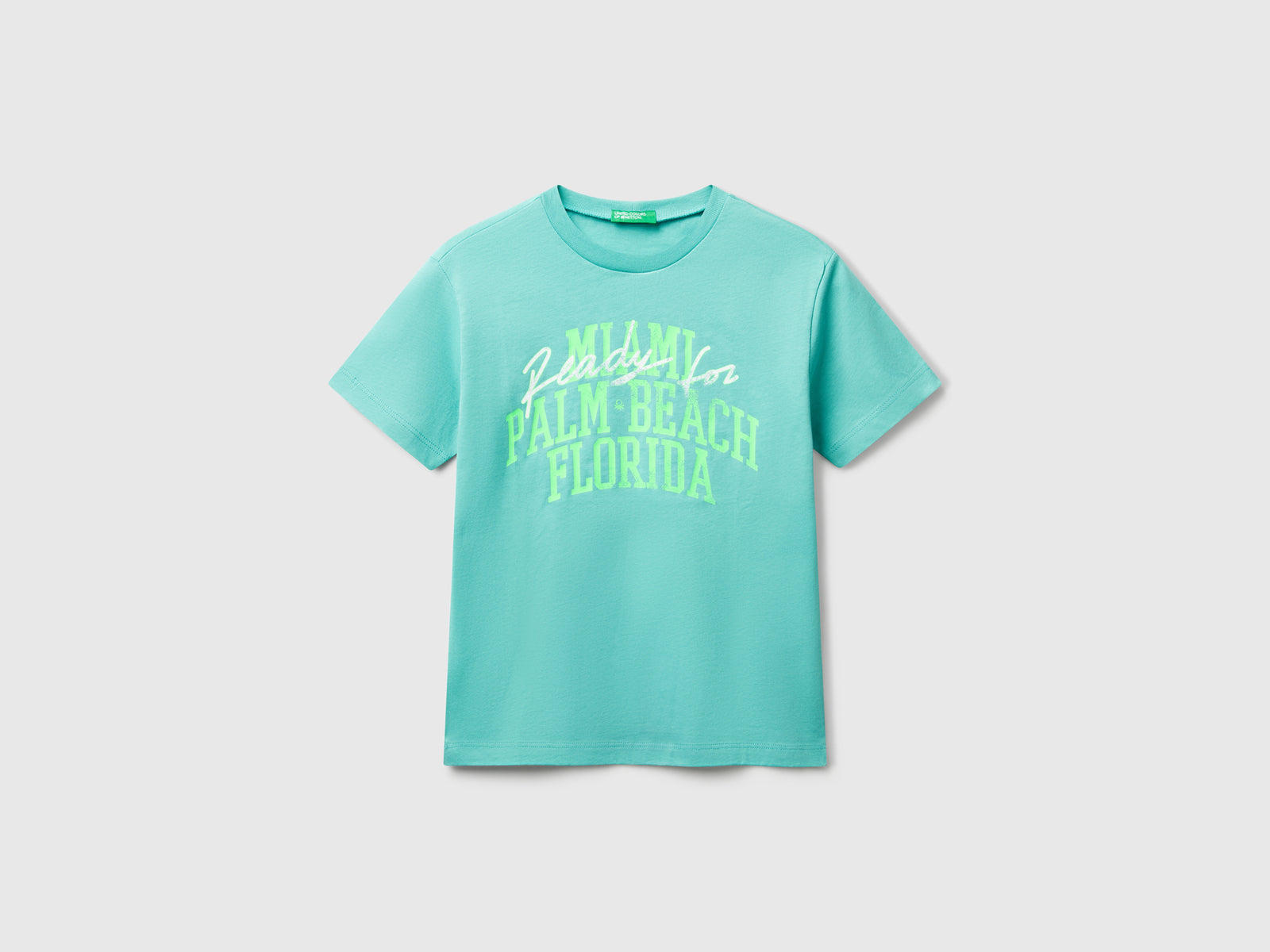 T-shirt con stampa fluo da bambino verde acqua | Benetton Outlet