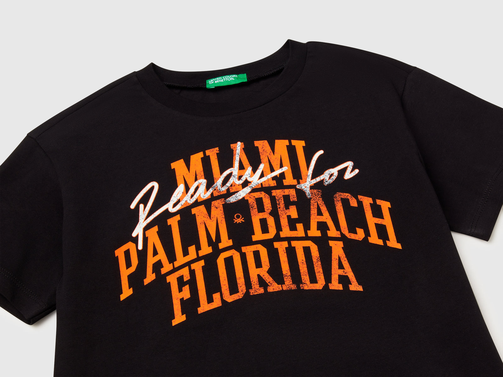 T-shirt con stampa fluo da bambino nero 3 | Benetton Outlet