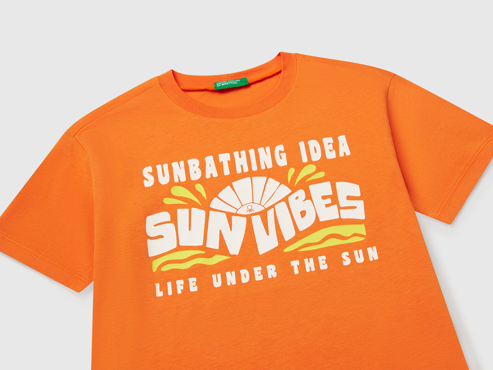 T-shirt con stampa fluo da bambino arancione 3 | Benetton Outlet