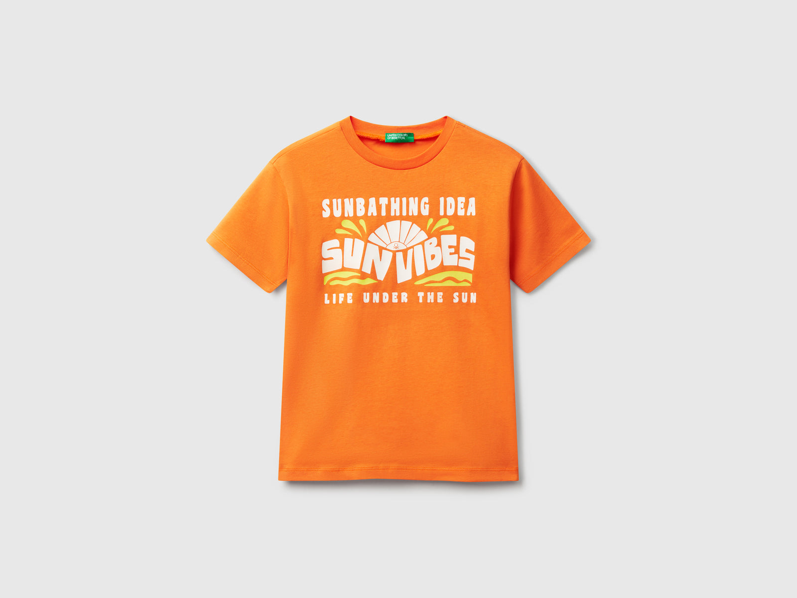 T-shirt con stampa fluo da bambino arancione | Benetton Outlet
