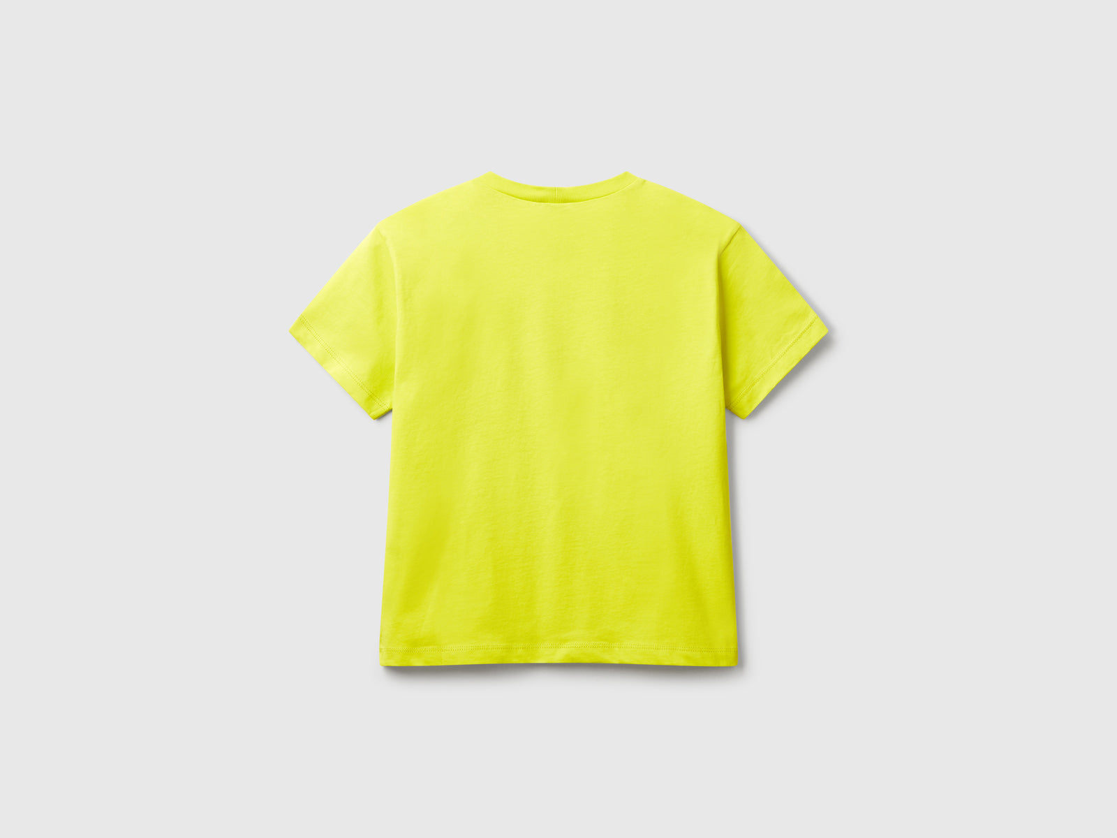 T-shirt con stampa fluo da bambino giallo fluo 2 | Benetton Outlet