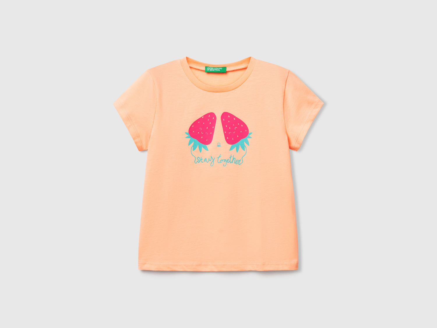 T-shirt con stampa fluo da bimba pesca | Benetton Outlet