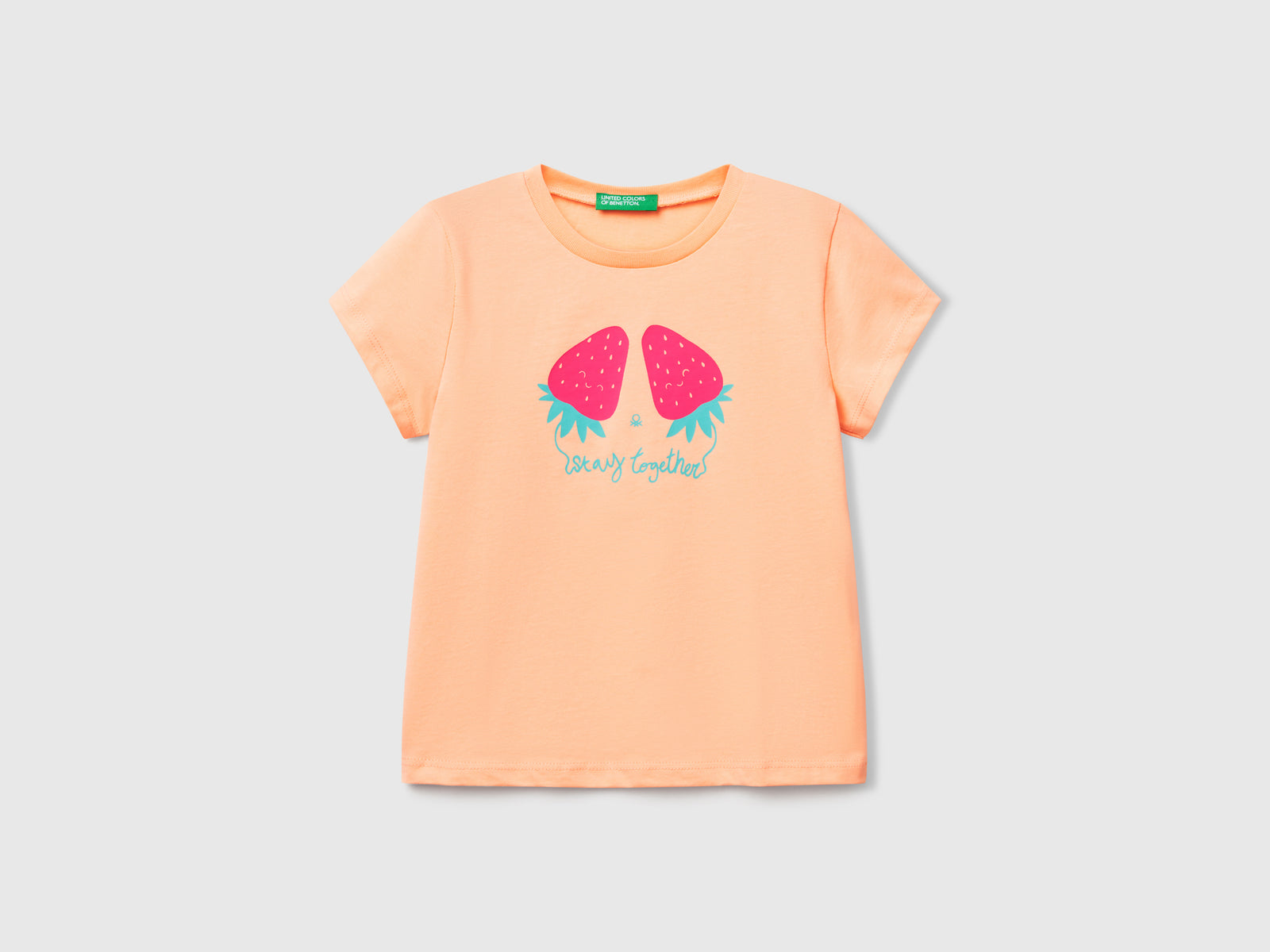 T-shirt con stampa fluo da bimba pesca | Benetton Outlet
