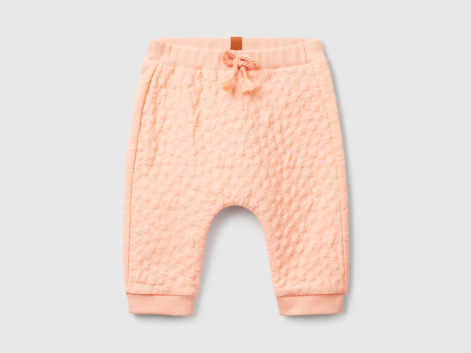 Pantaloni jacquard da neonato pesca | Benetton Outlet