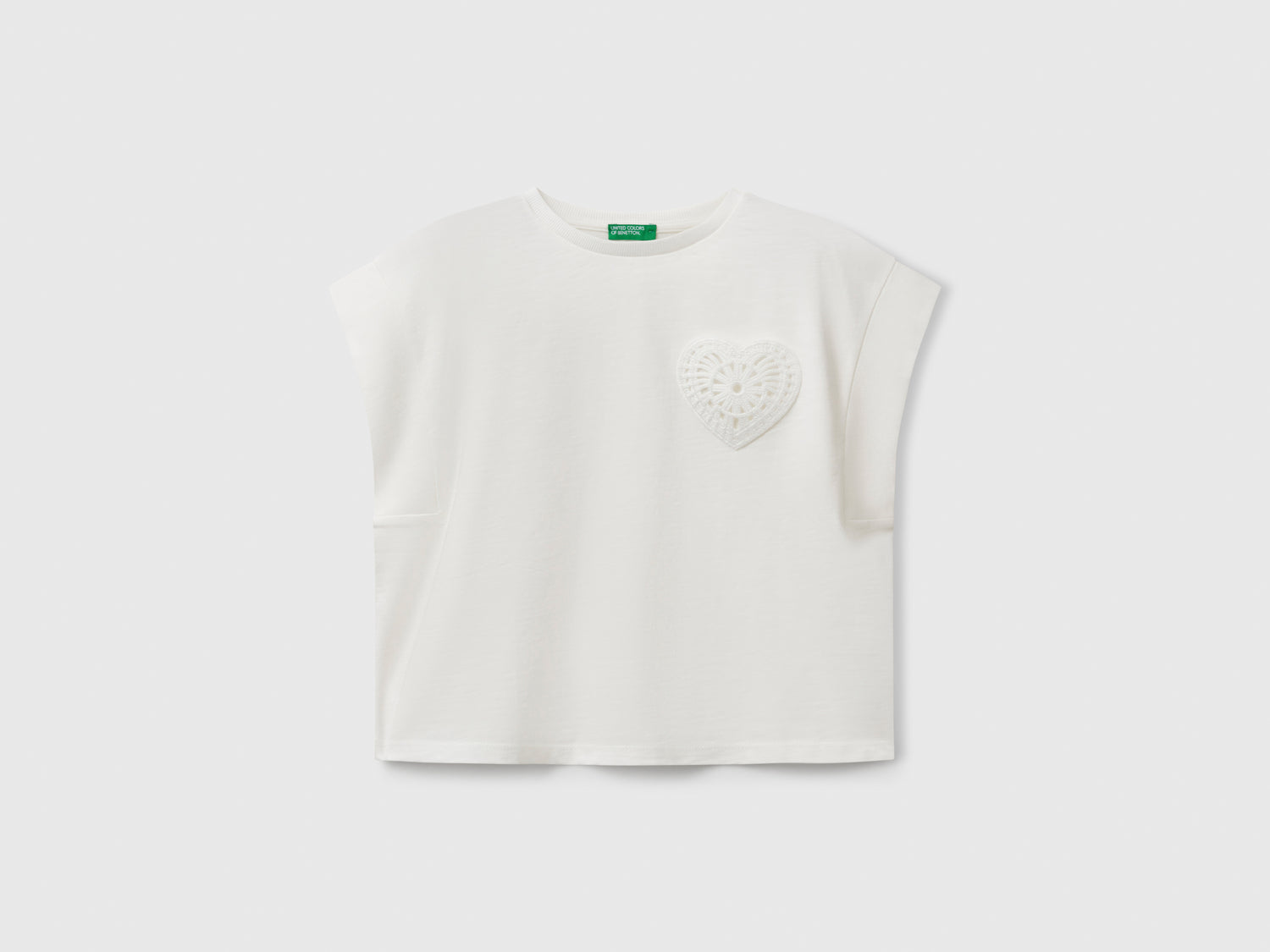 T-shirt con patch macramè da bambina bianco panna | Benetton Outlet