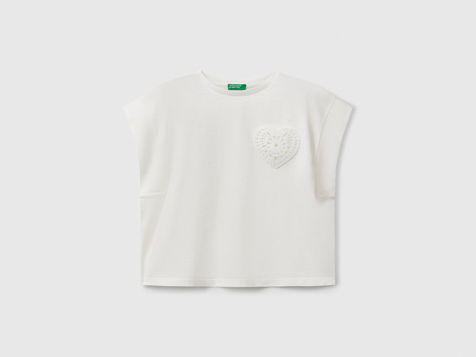T-shirt con patch macramè da bambina bianco panna | Benetton Outlet