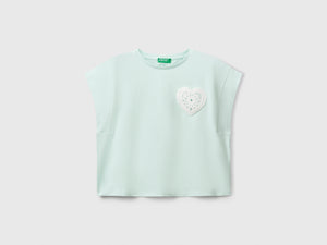 T-shirt con patch macramè