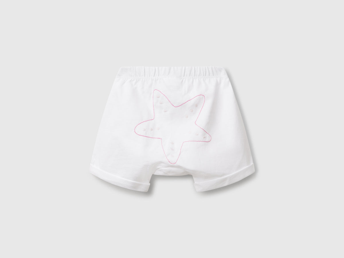 Shorts con patch sul retro