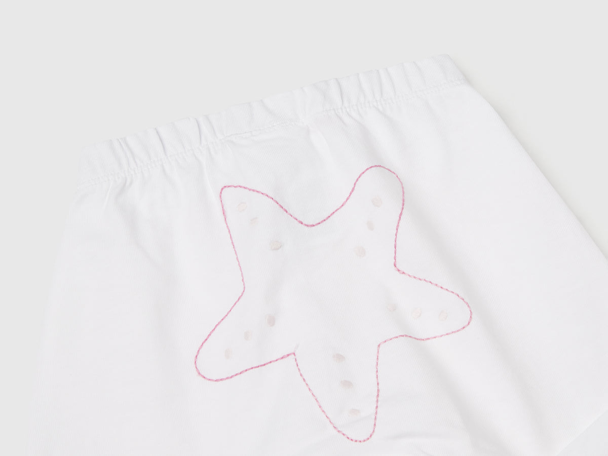 Shorts con patch sul retro