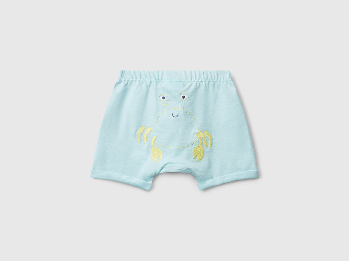 Shorts con patch sul retro
